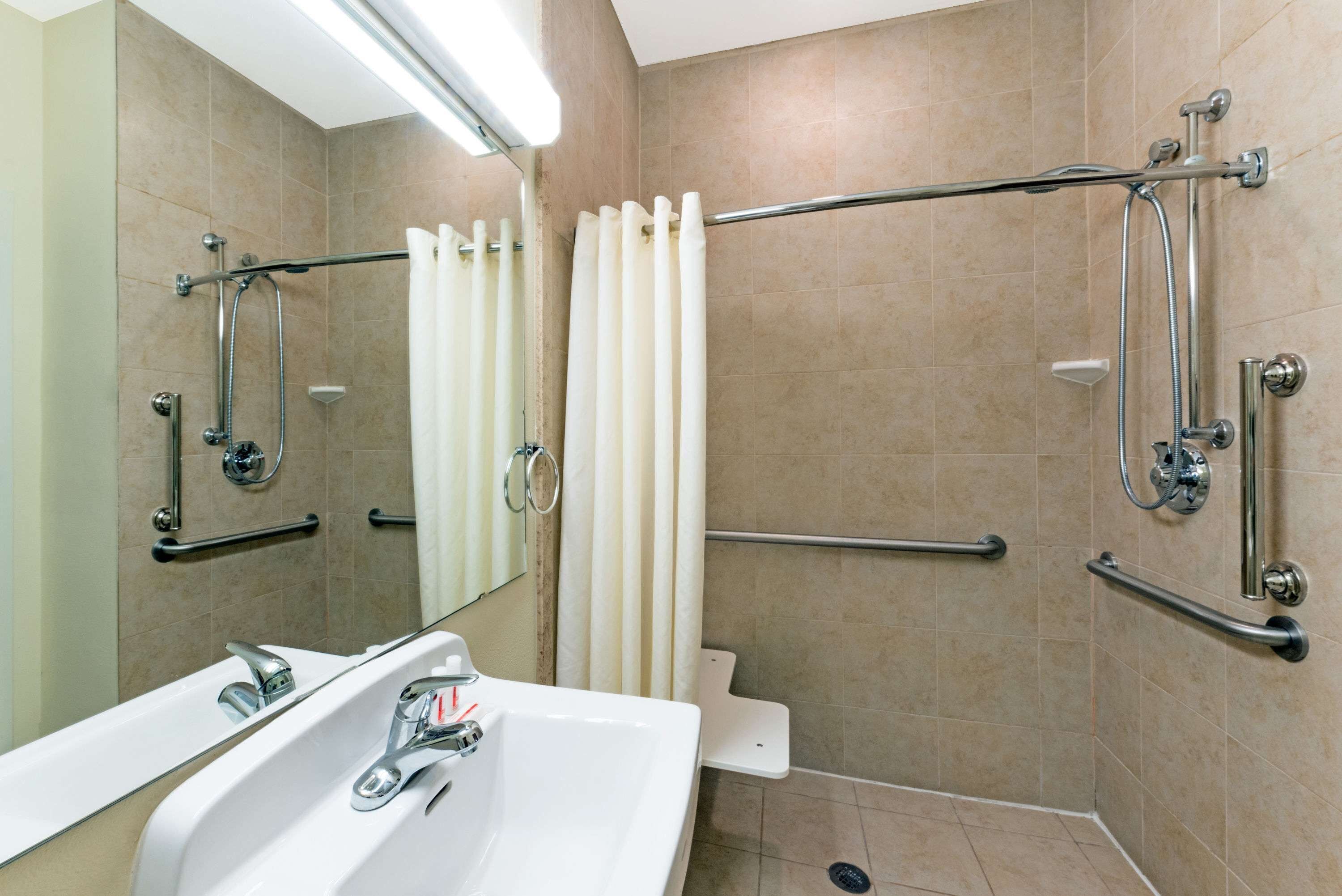 combined shower/bathtub, free toiletries, hair dryer, towels