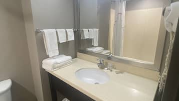 Hair dryer, towels, soap, shampoo
