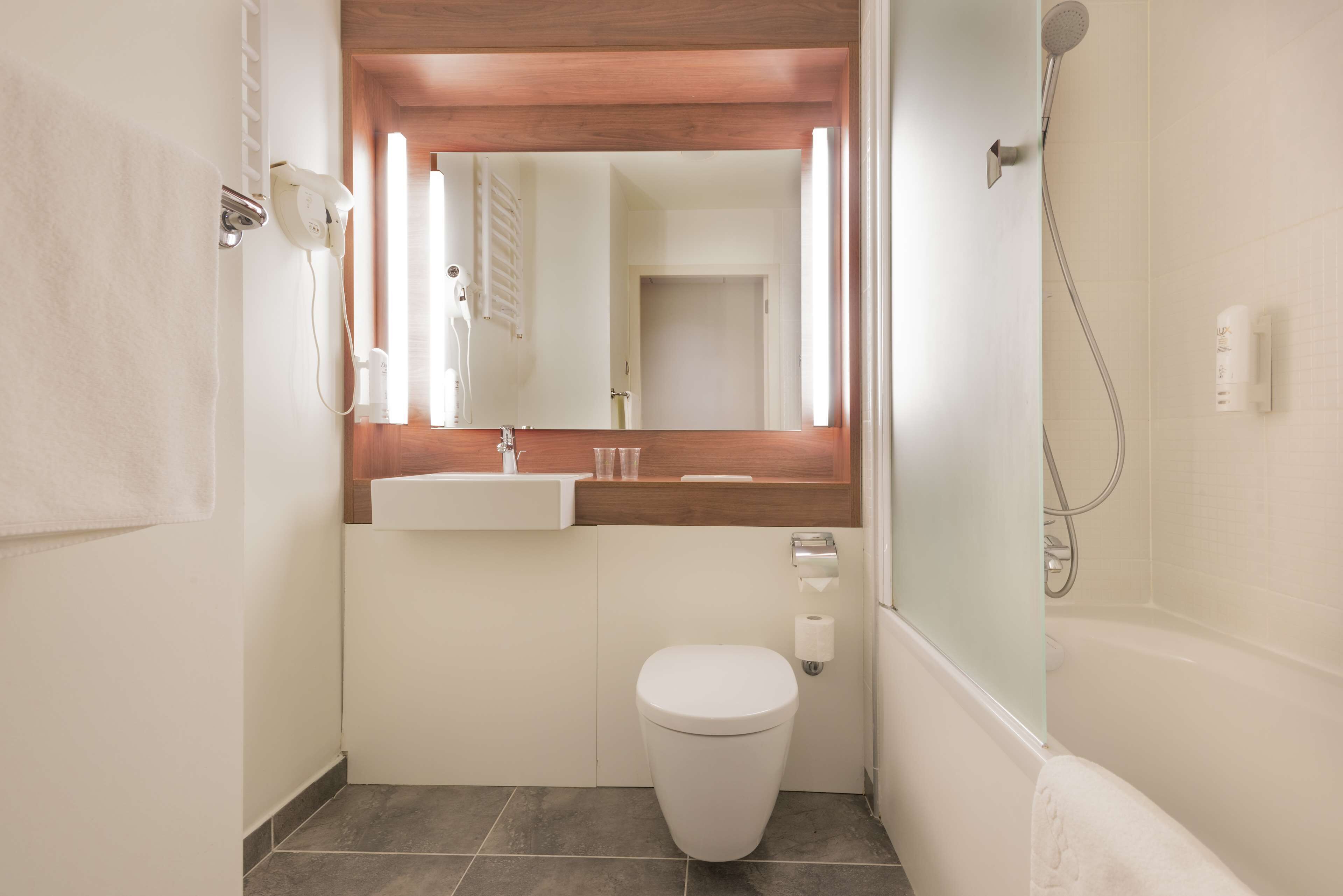 eco-friendly toiletries, hair dryer, towels