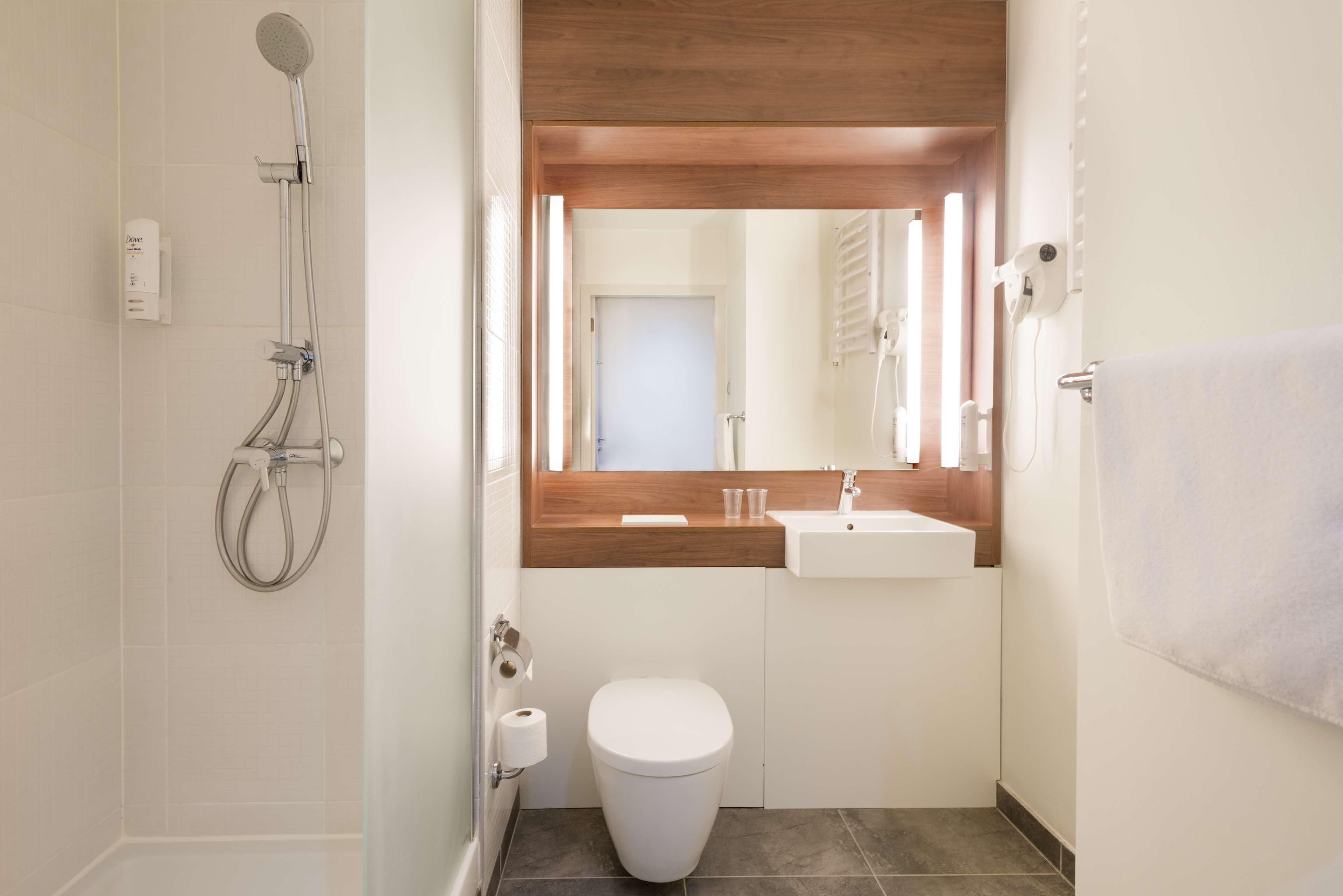 eco-friendly toiletries, hair dryer, towels