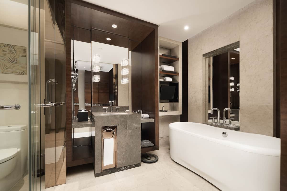 separate bathtub and shower, rainfall showerhead, hair dryer, bathrobes