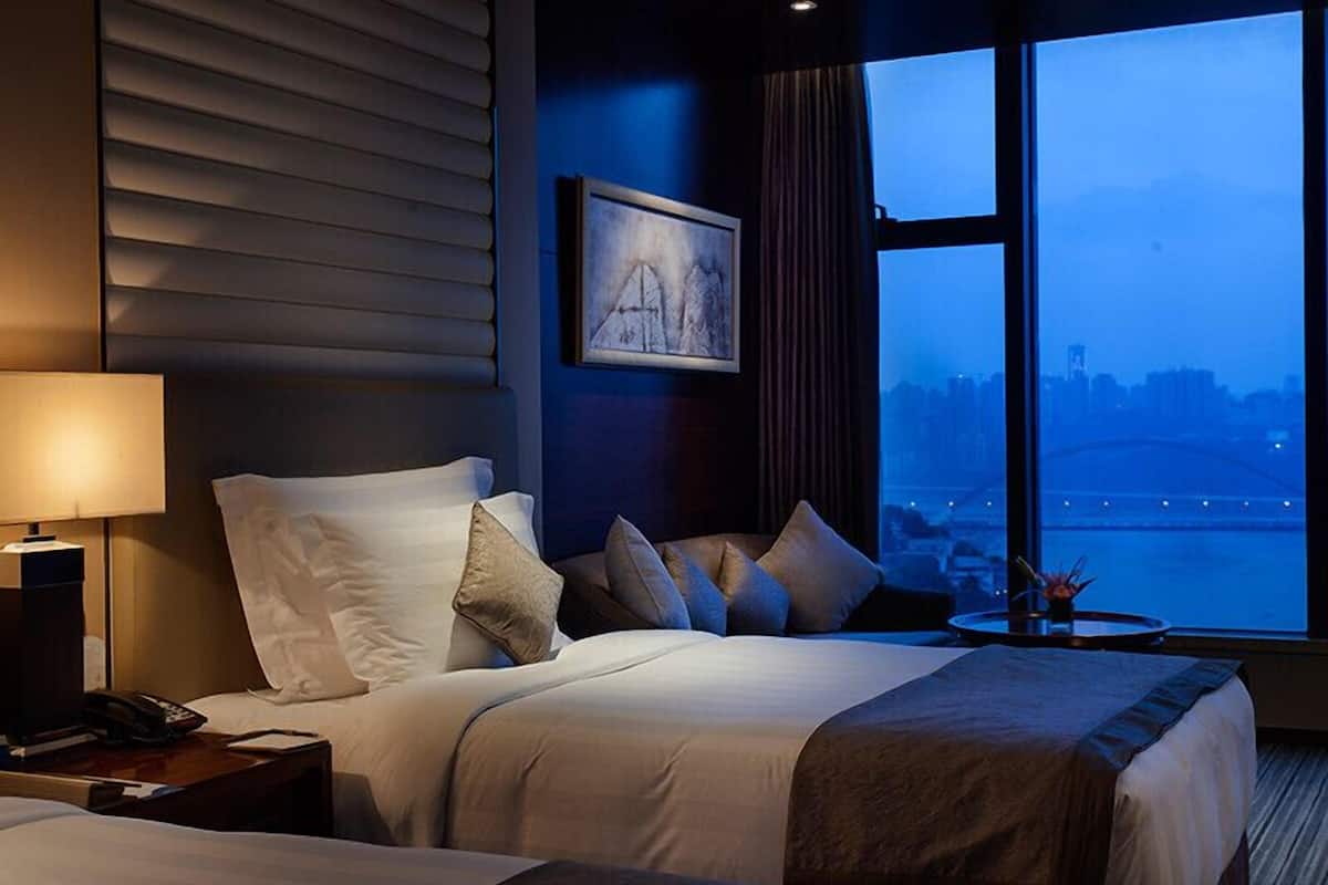 premium room, river view | hypo-allergenic bedding, down duvets, minibar, in-room safe