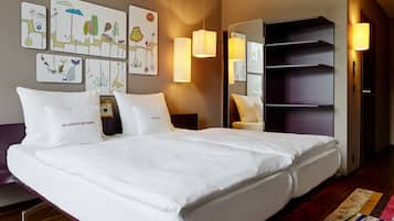 Large | Premium bedding, down duvets, minibar, in-room safe