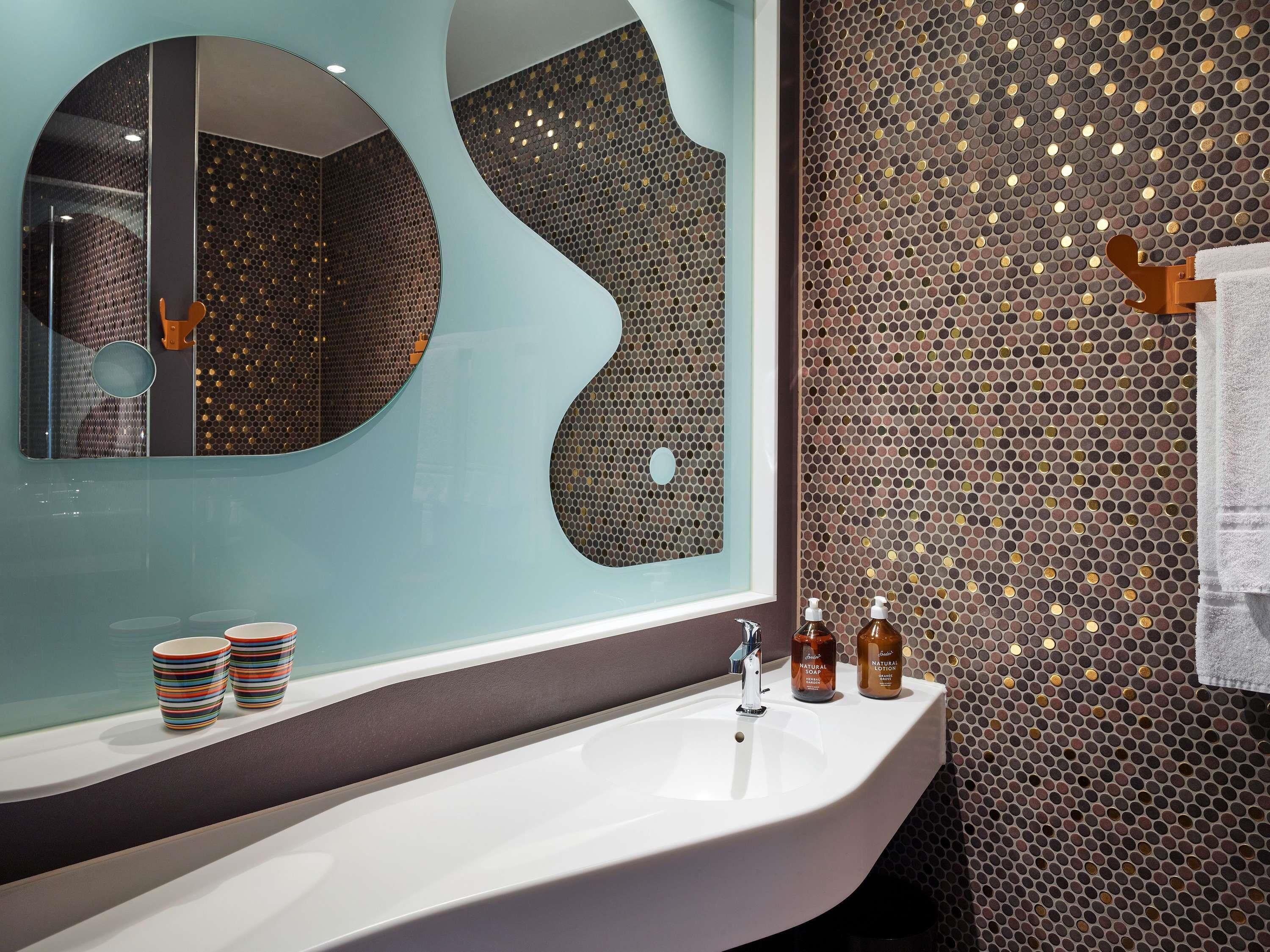 vitality suite | bathroom | designer toiletries, hair dryer, towels, soap