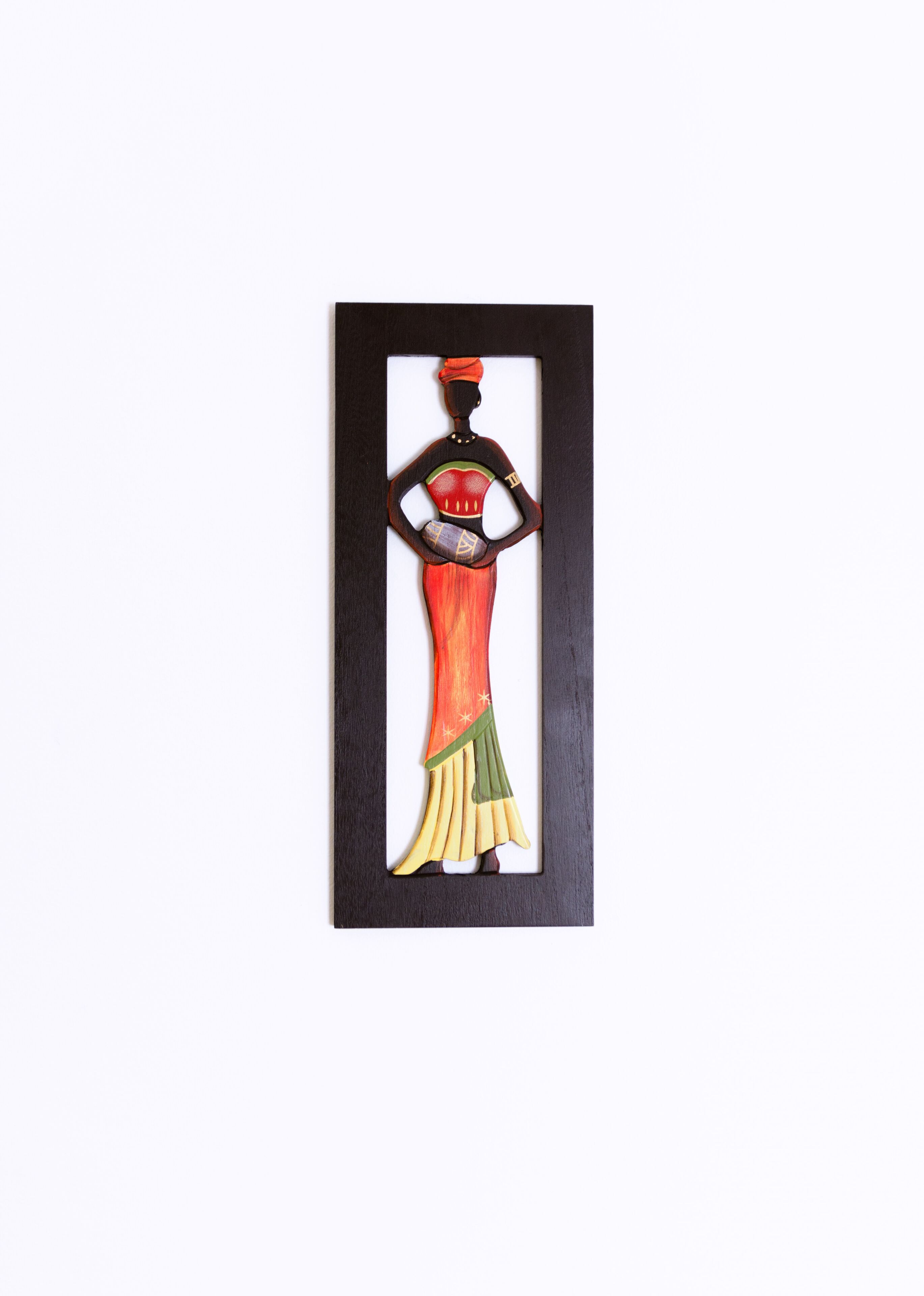 A framed artwork of a woman in traditional attire.
