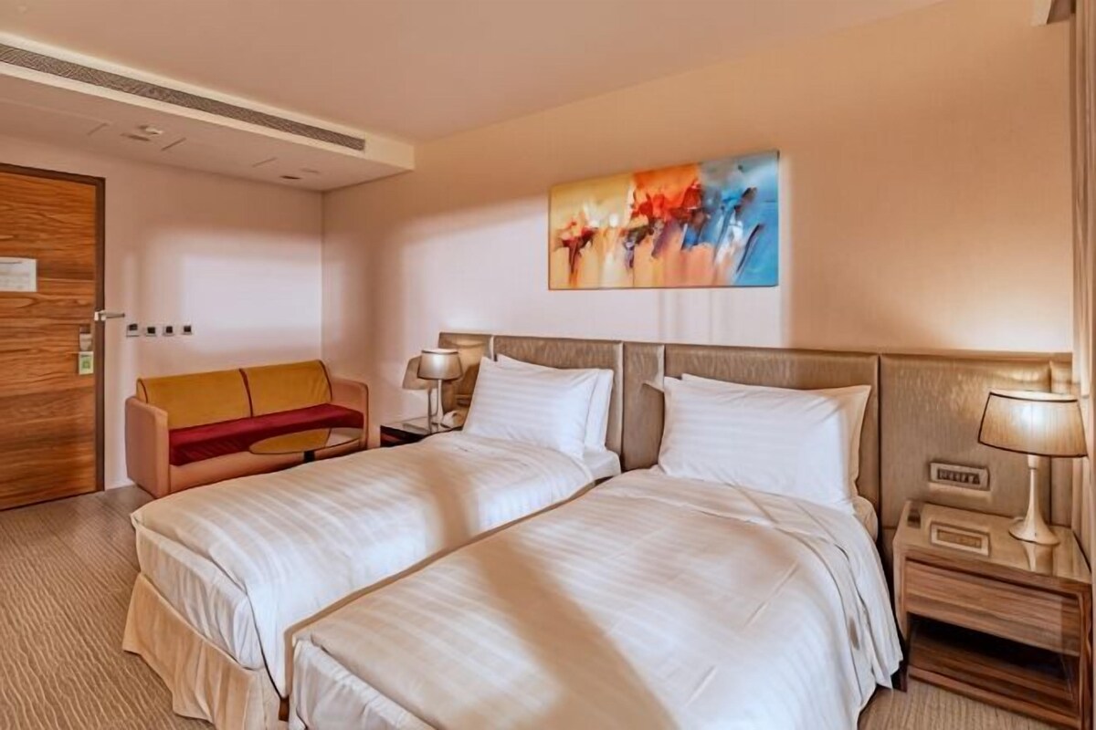 Premium bedding, down duvets, minibar, in-room safe