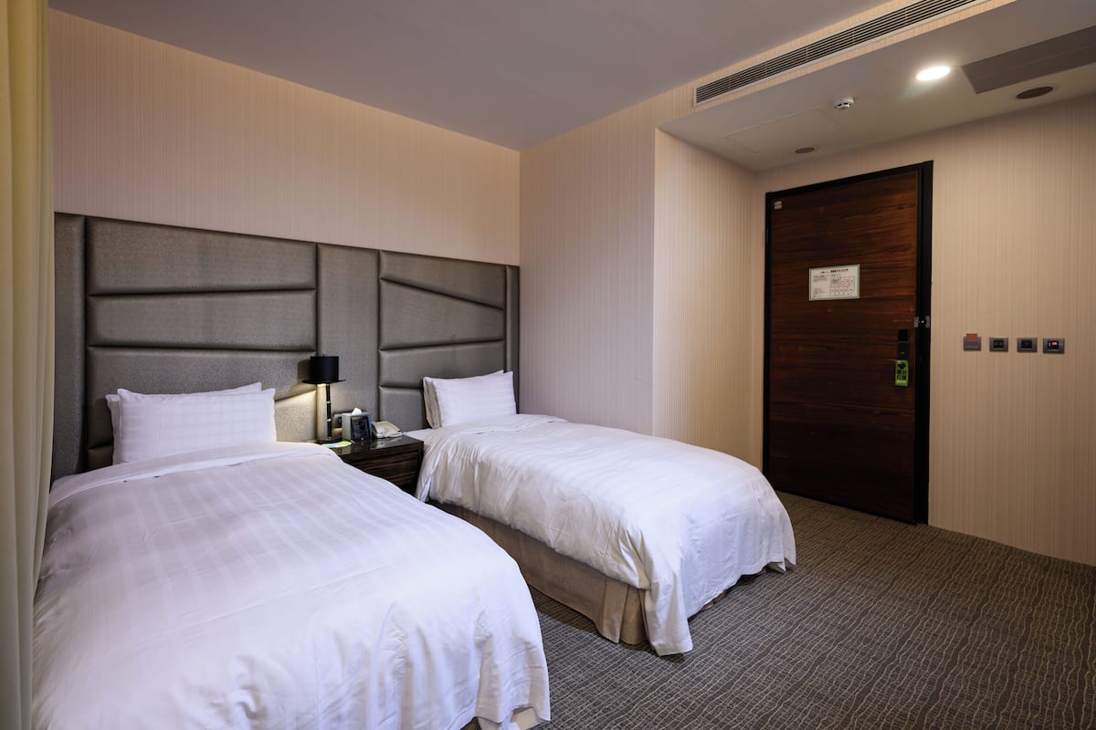 1 habitación, ropa de cama de alta calidad, cubrecamas y minibar