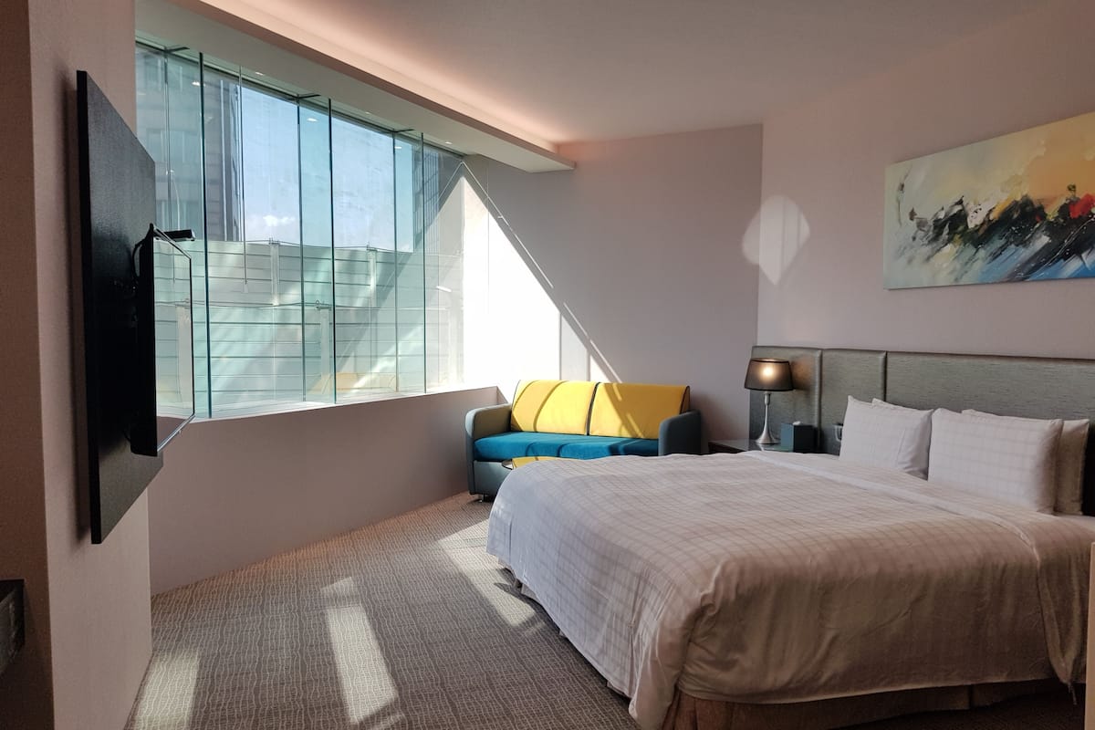 1 habitación, ropa de cama de alta calidad, cubrecamas y minibar