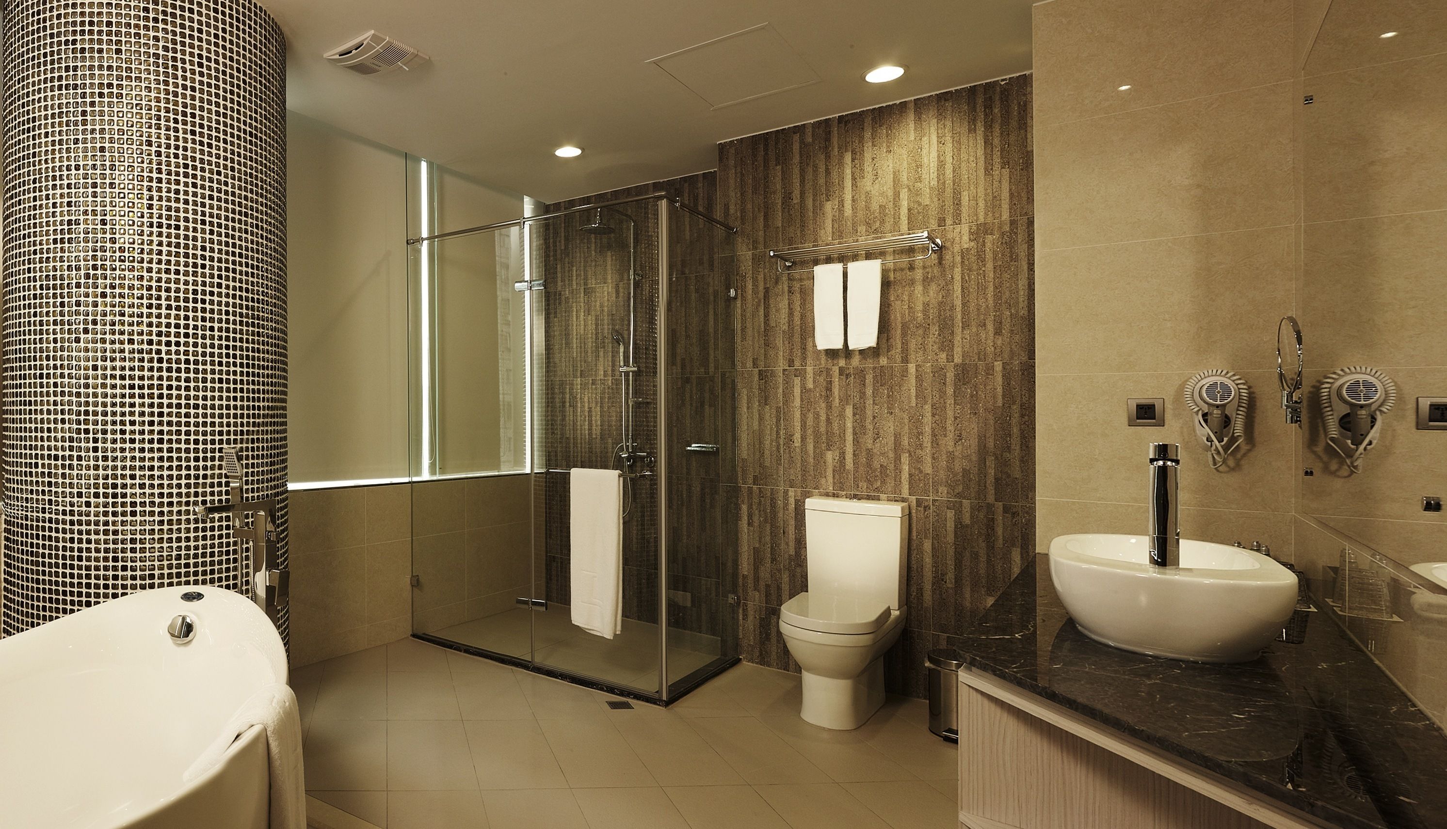 grand suite | bathroom | separate bathtub and shower, deep-soaking bathtub, hair dryer, slippers