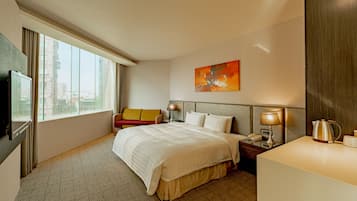 Premium bedding, down comforters, minibar, in-room safe