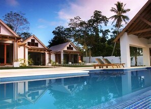 Outdoor pool, free pool cabanas, pool umbrellas