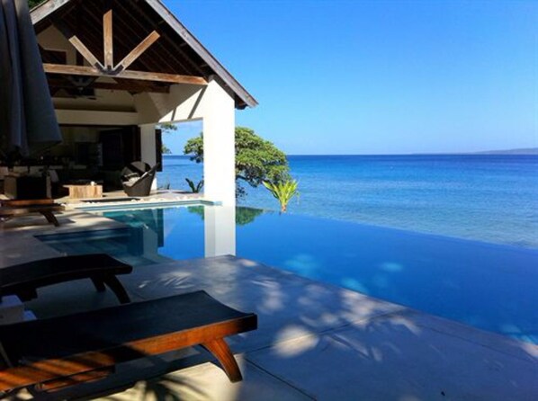 Outdoor pool, free pool cabanas, pool umbrellas