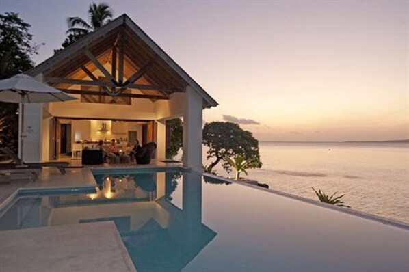 Outdoor pool, free pool cabanas, pool umbrellas