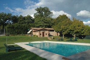 Outdoor pool, pool umbrellas, pool loungers