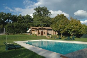 Outdoor pool, pool umbrellas, sun loungers