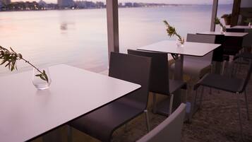 Breakfast, lunch, dinner served; Mediterranean cuisine, beach views