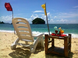 På stranden och gratis transport till/från stranden