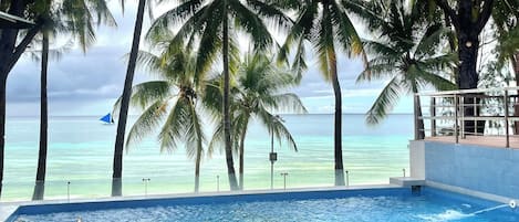 2 outdoor pools, open 9:00 AM to 8:00 PM, pool umbrellas, pool loungers