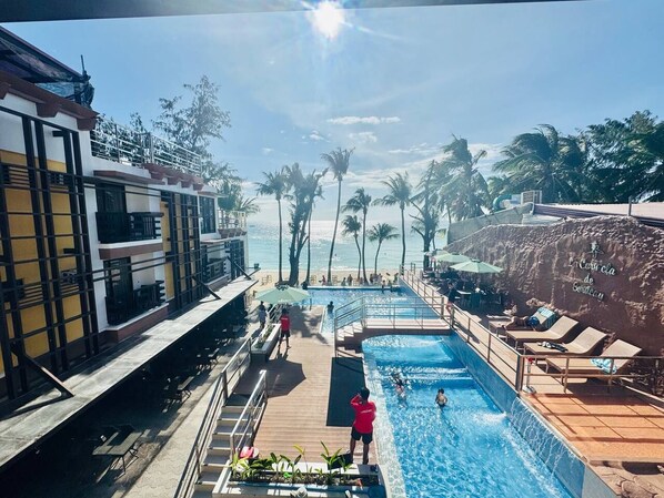 2 outdoor pools, open 9:00 AM to 8:00 PM, pool umbrellas, sun loungers - La Carmela De Boracay Resort Hotel (Boracay Island)