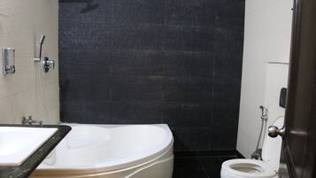 Suite Room | Bathroom | Shower, designer toiletries, hair dryer, slippers
