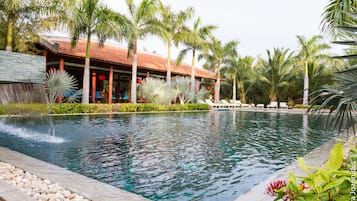 Outdoor pool, pool umbrellas, sun loungers