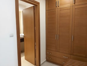 Deep-soaking bathtub, designer toiletries, hair dryer, bathrobes