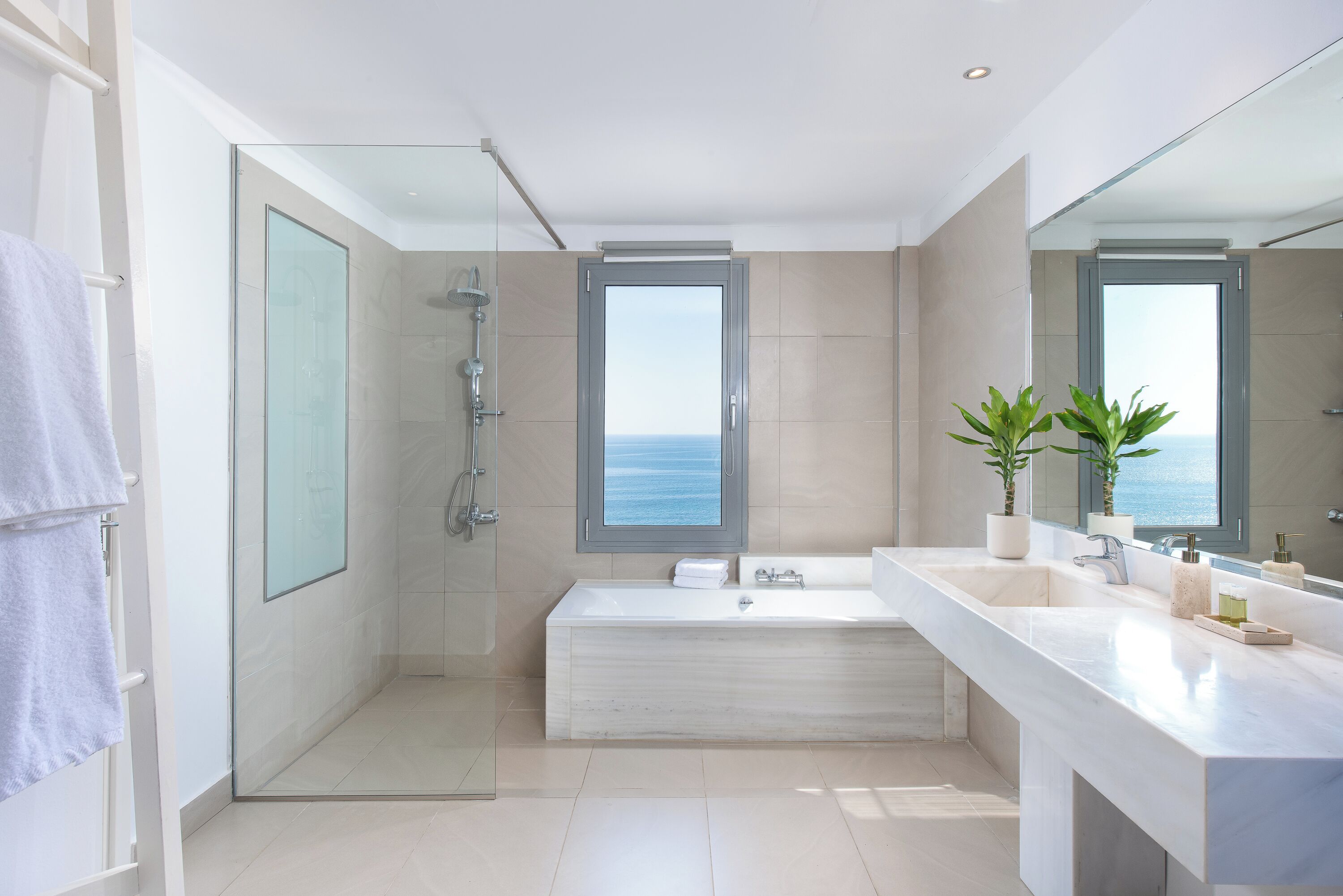 honeymoon suite, sea view | bathroom | free toiletries, hair dryer, slippers, towels