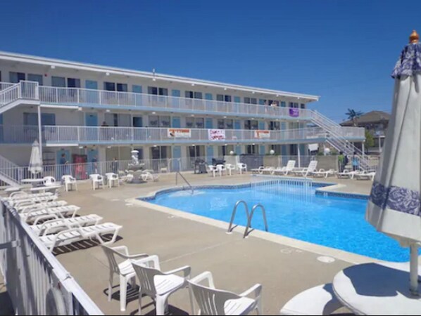 Seasonal outdoor pool, open 10:00 AM to 8 PM, pool loungers