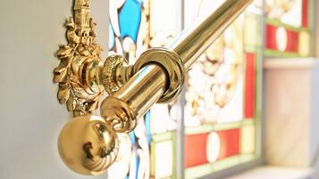 A brass door handle and lock mechanism.