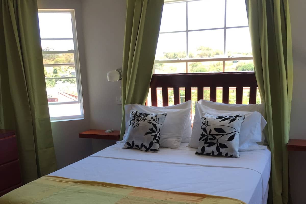 Superior Apartment, 2 Bedrooms, Kitchen, Pool View | 1 bedroom, in-room safe, individually decorated, individually furnished