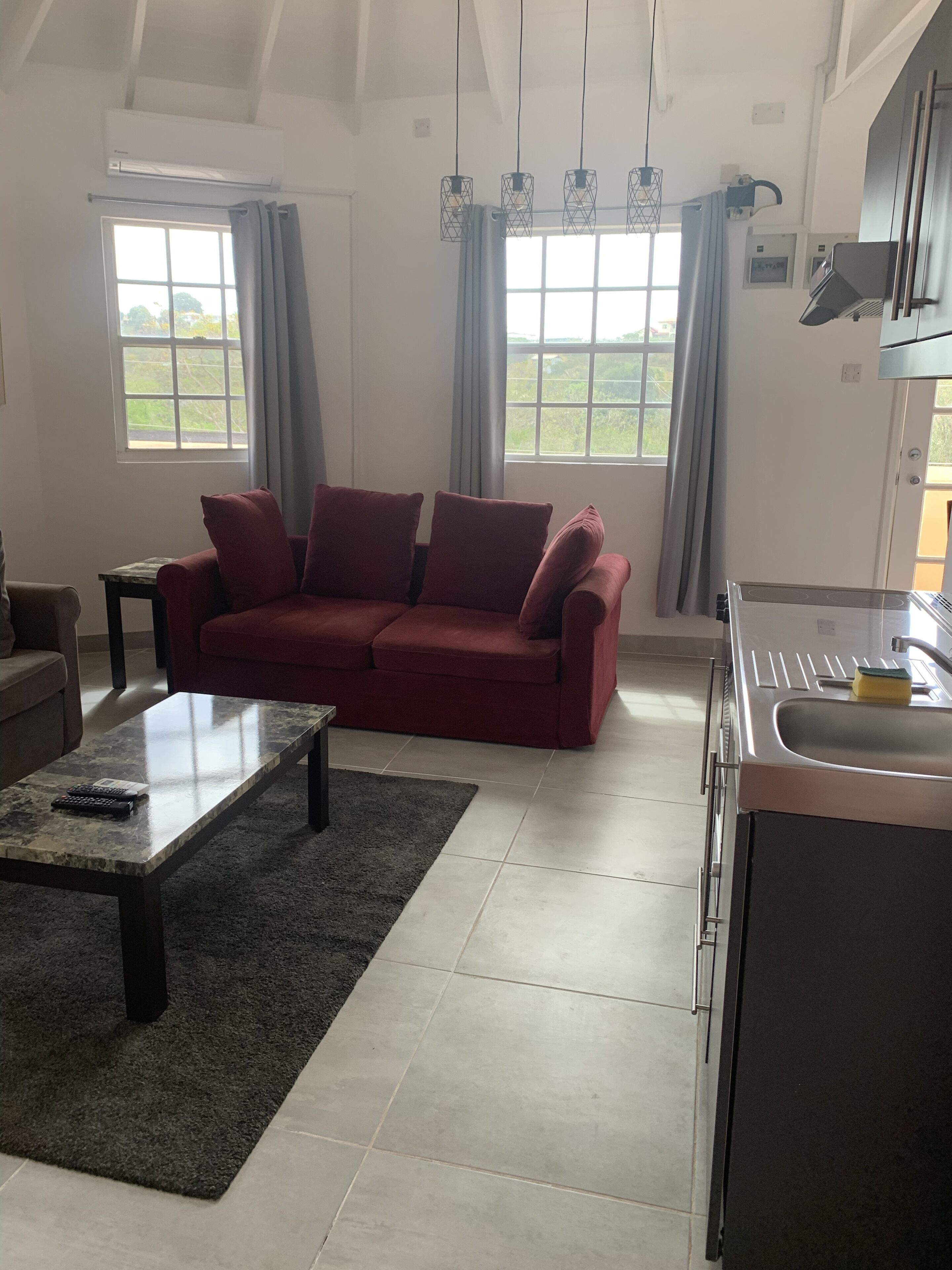 Suite, 1 Queen Bed (Roof-Top) | Living area | 32-inch flat-screen TV with digital channels, TV