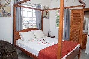 Suite, 1 Queen Bed (Roof-Top) | 1 bedroom, in-room safe, individually decorated, individually furnished