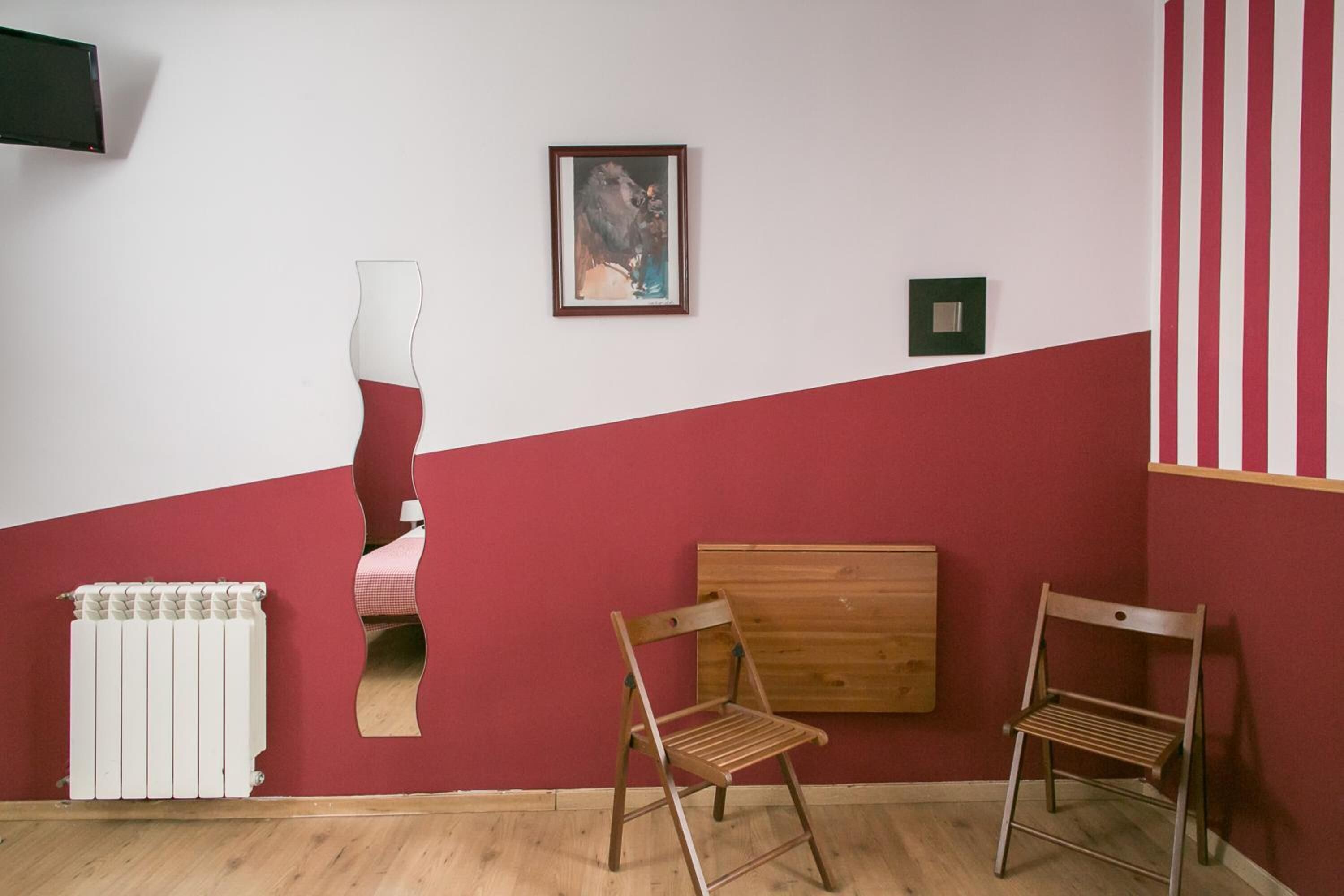 Foto - Hostal La Casa de La Plaza