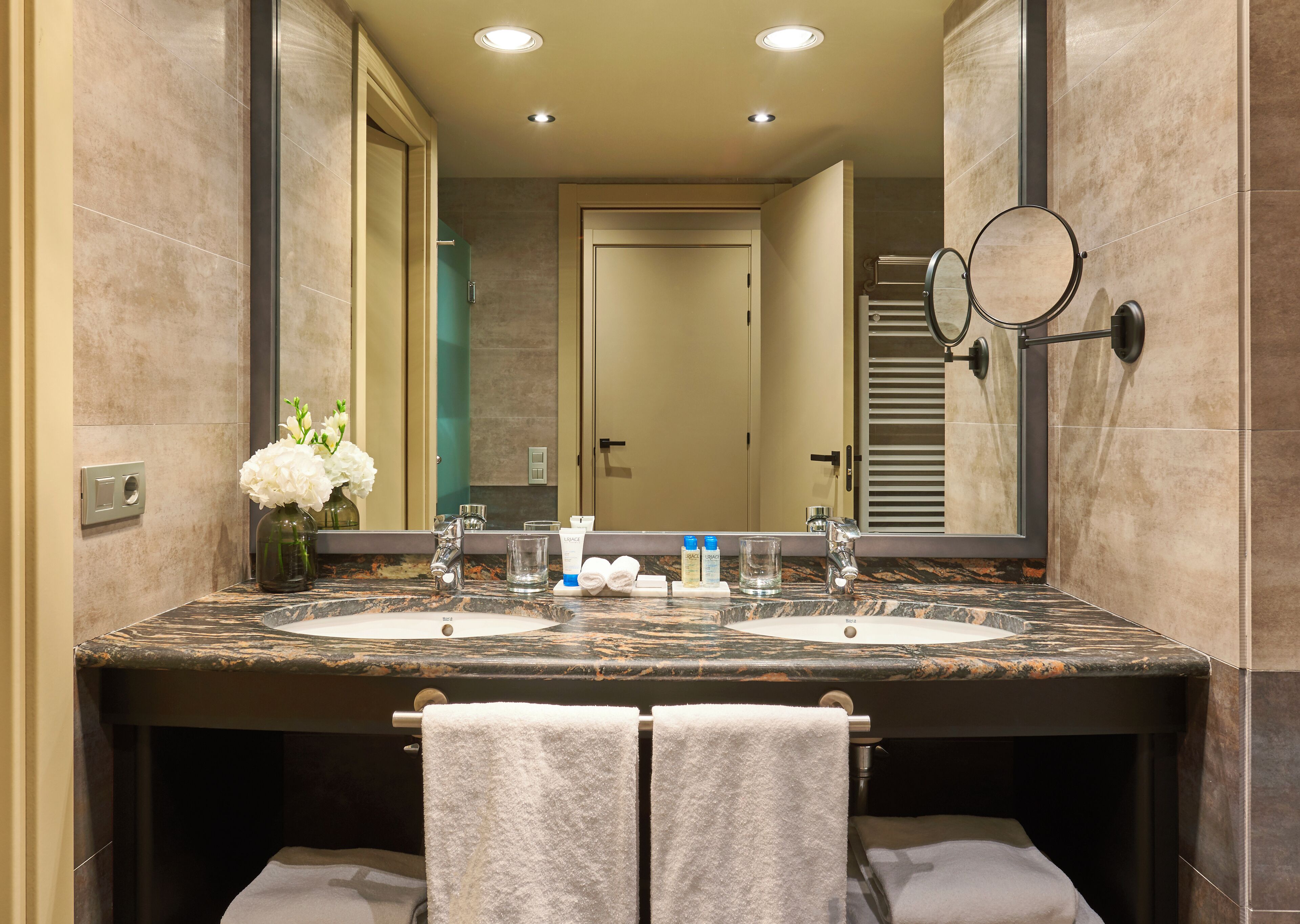 eco-friendly toiletries, hair dryer, bathrobes, slippers