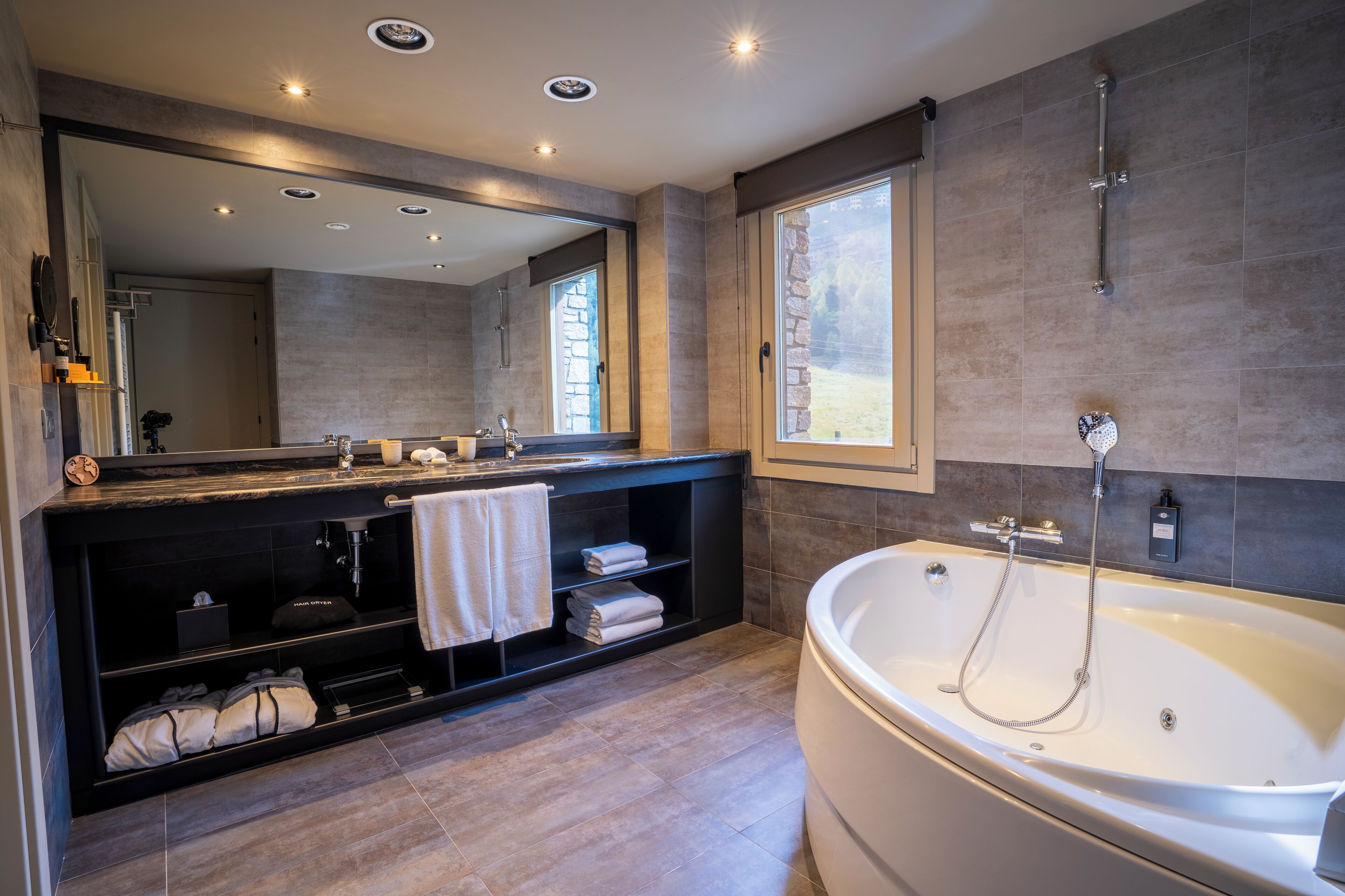 eco-friendly toiletries, hair dryer, bathrobes, slippers