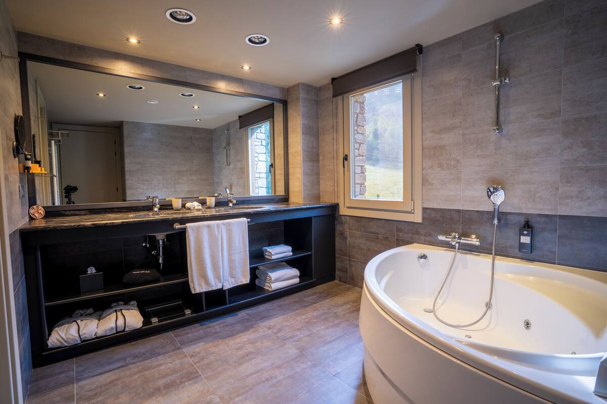 eco-friendly toiletries, hair dryer, bathrobes, slippers