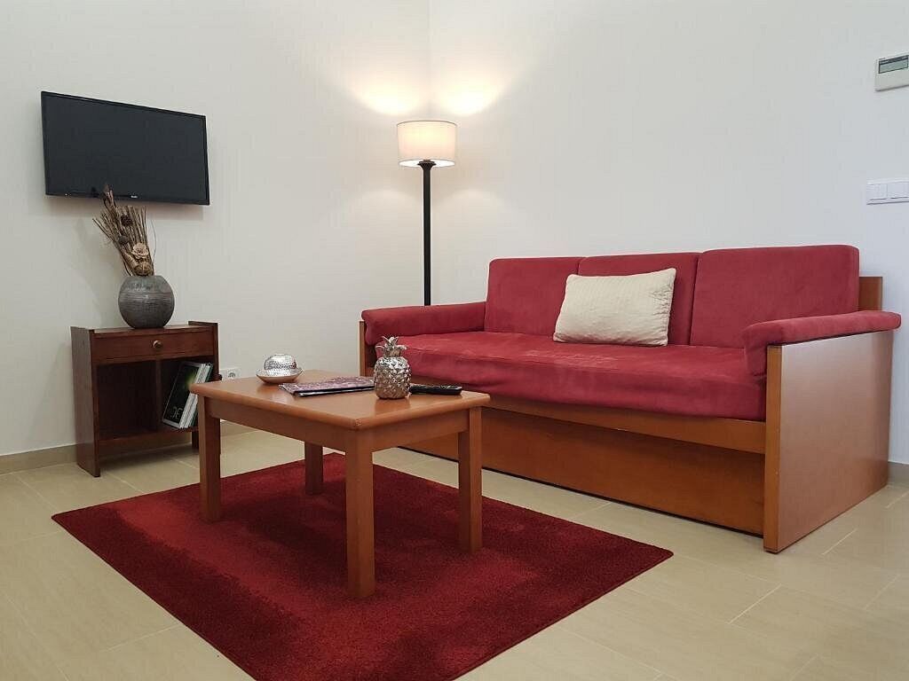 Executive-Bungalow | Wohnbereich | LCD-Fernseher