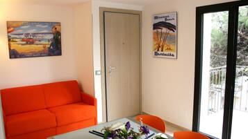 Apartment, 2 Bedrooms | Living area | 20-inch flat-screen TV with digital channels, TV