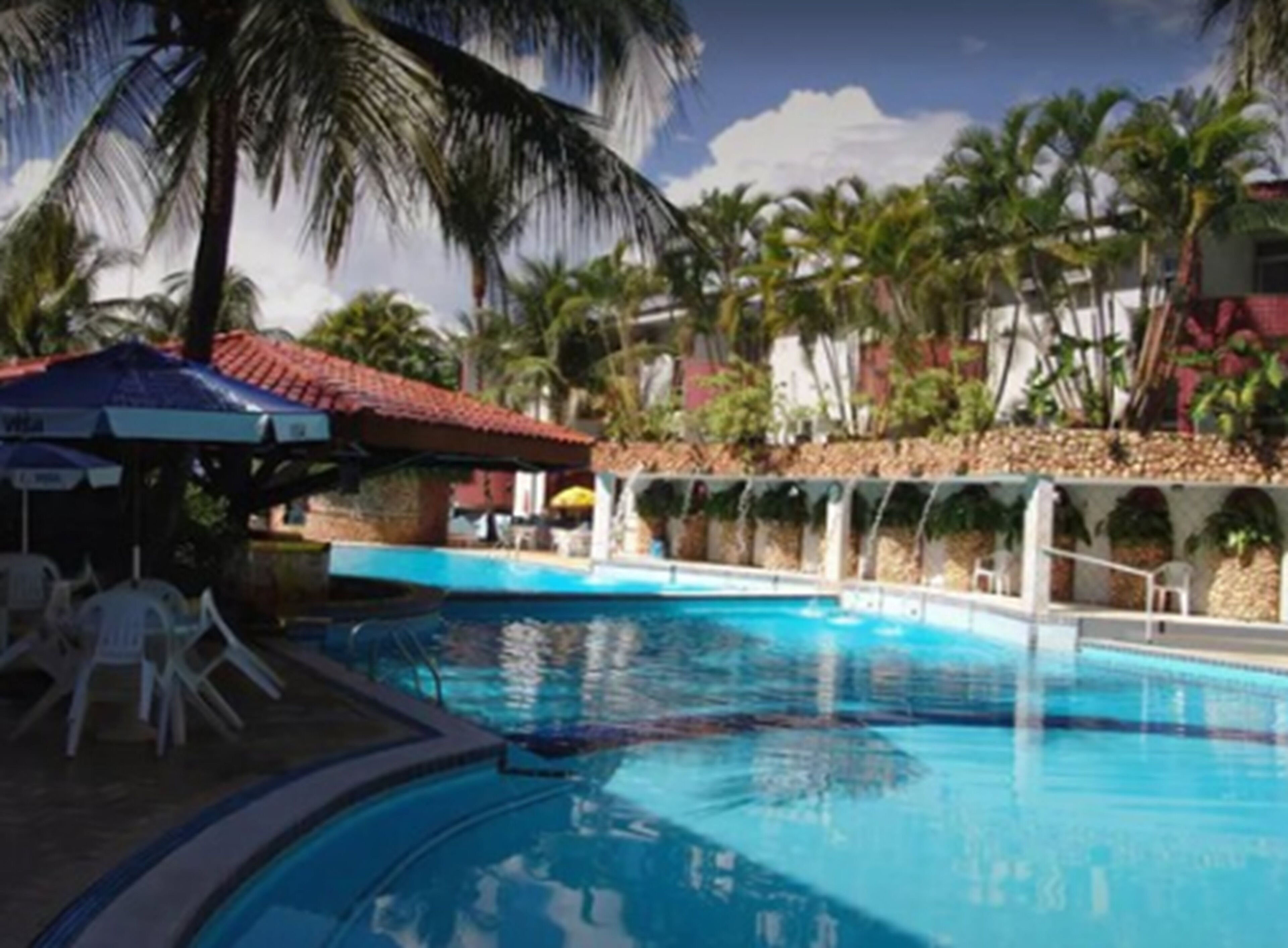 2 outdoor pools, pool umbrellas, pool loungers