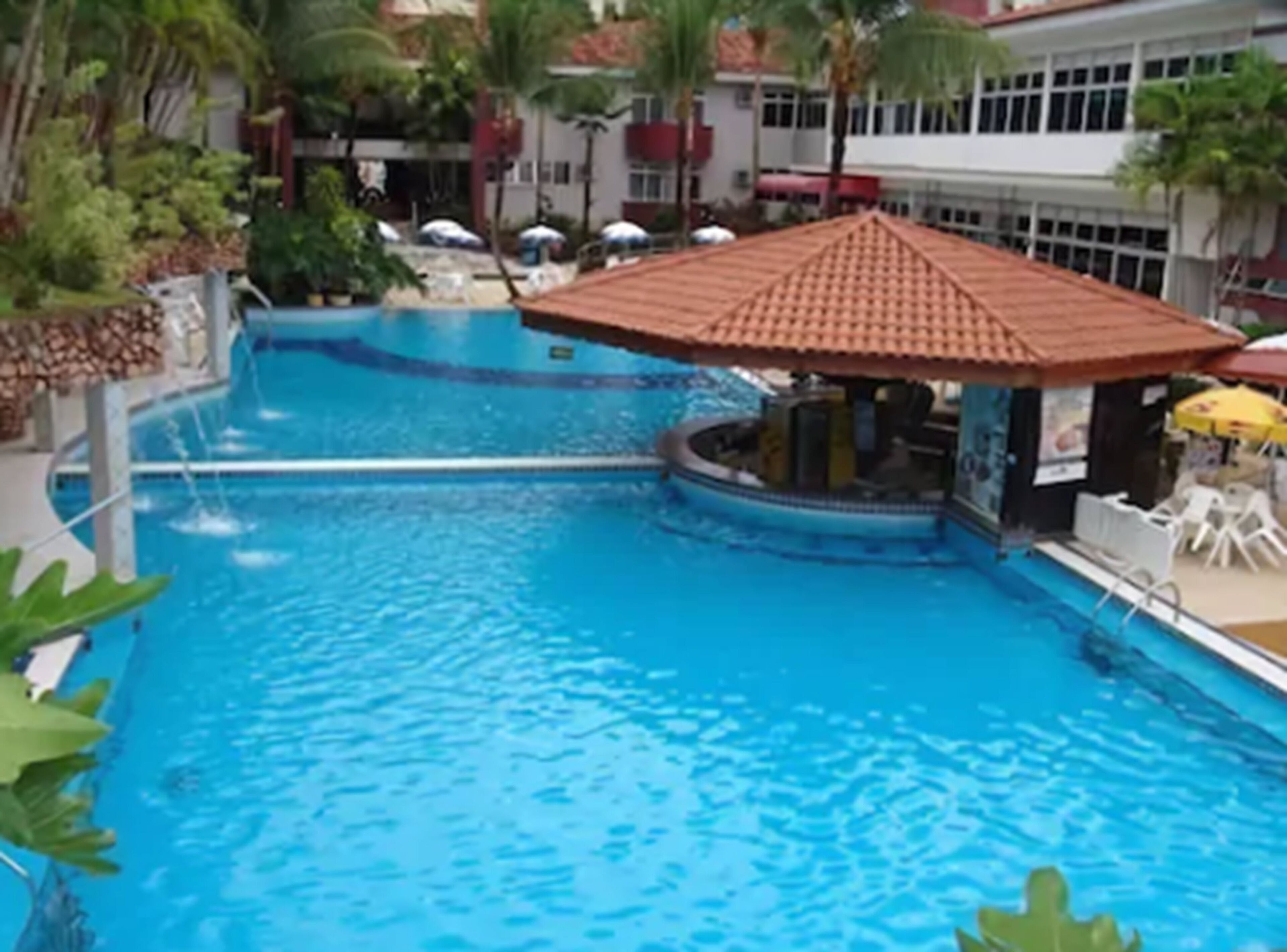 2 outdoor pools, pool umbrellas, pool loungers