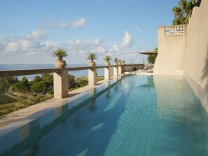 Seasonal outdoor pool, pool umbrellas, sun loungers