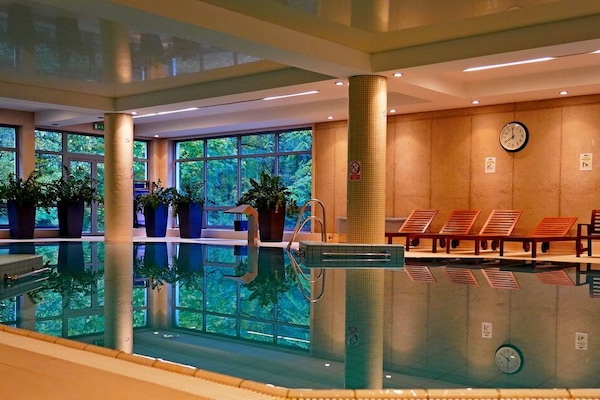 Indoor pool, open 8:00 AM to 9:00 PM, lifeguards on site
