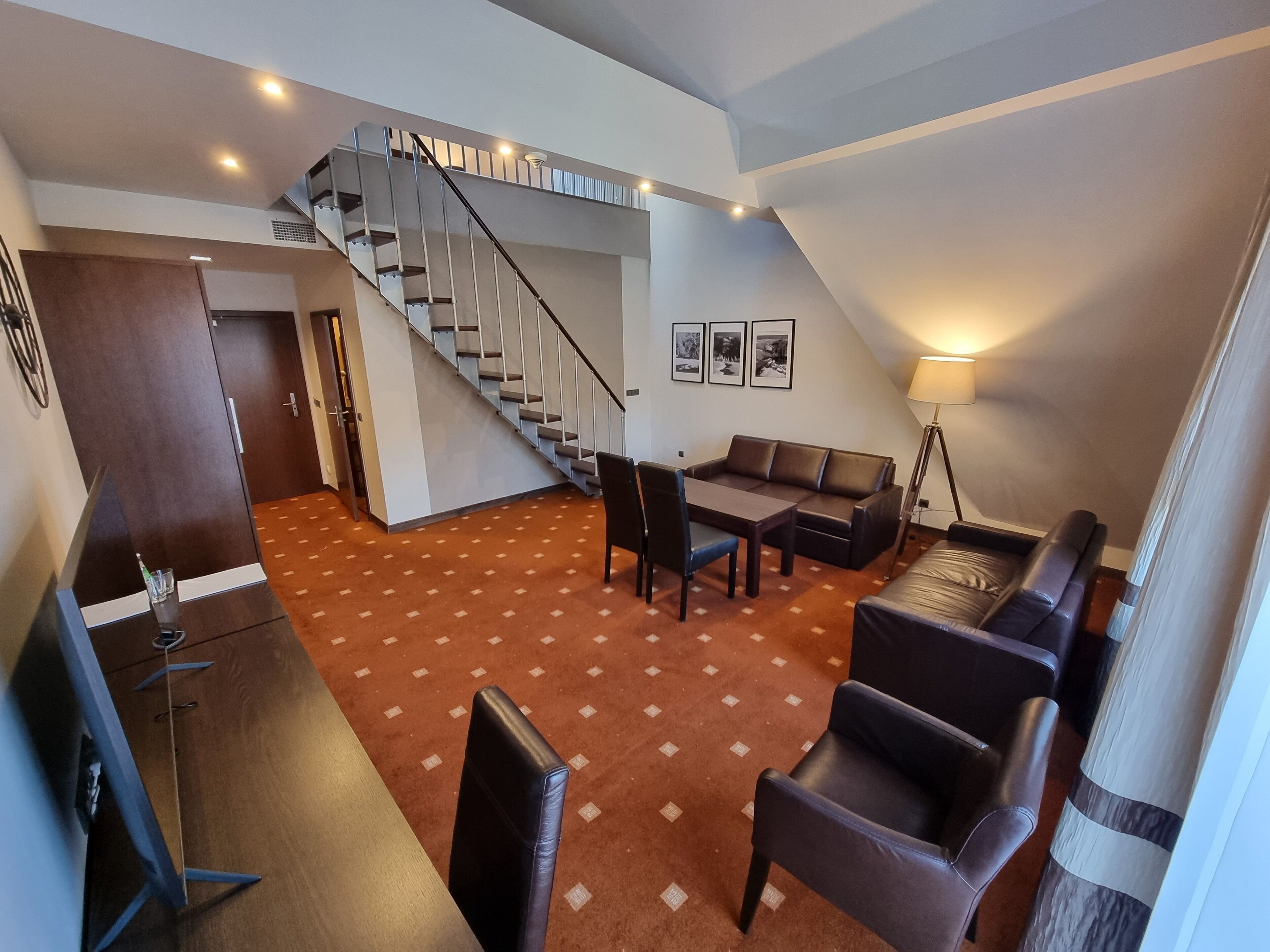 family studio | living area | tv, table football, ping pong, books