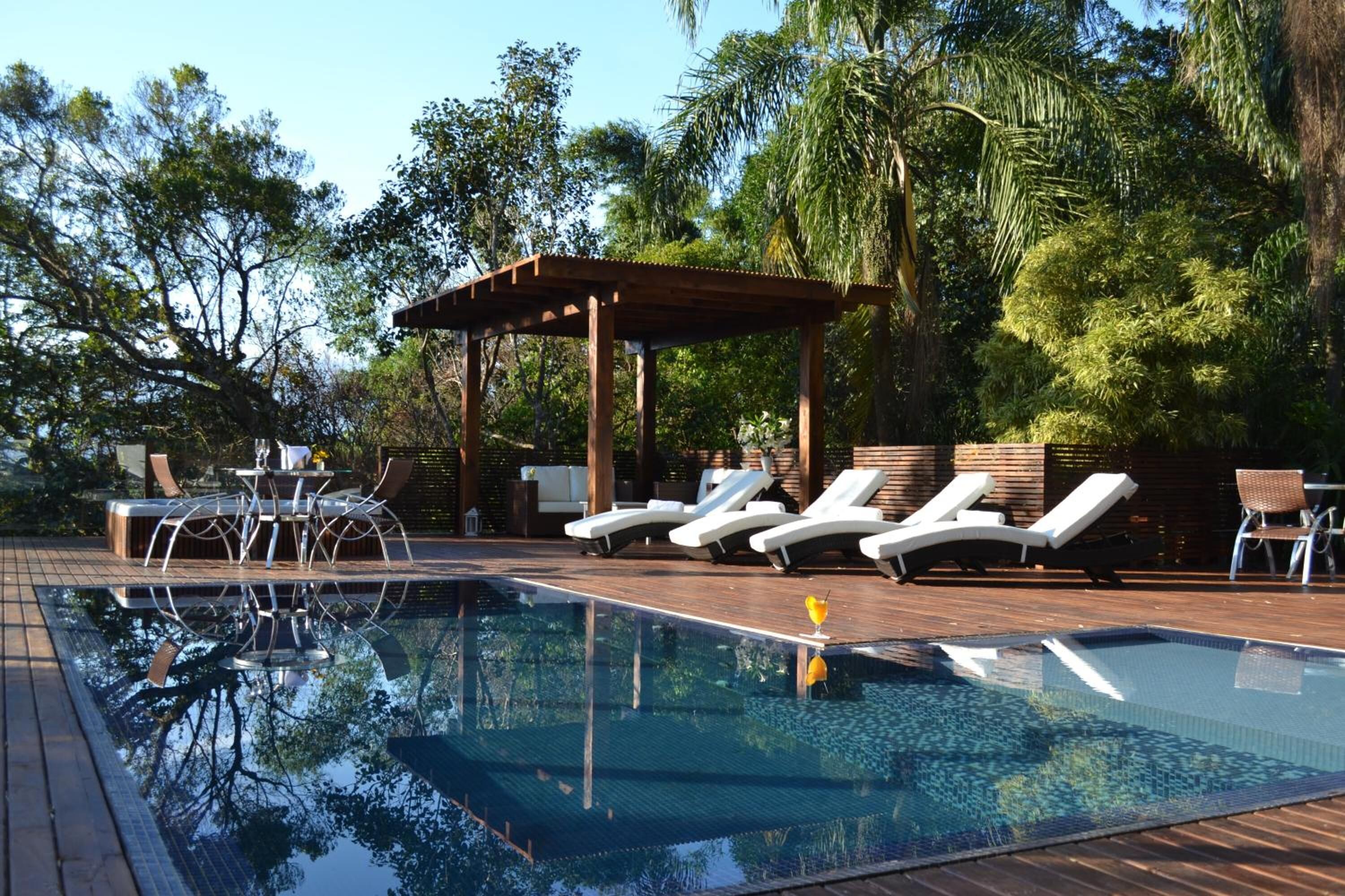 outdoor pool, pool loungers