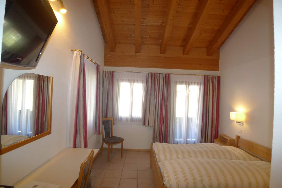 Premium bedding, down duvets, pillow-top beds, desk