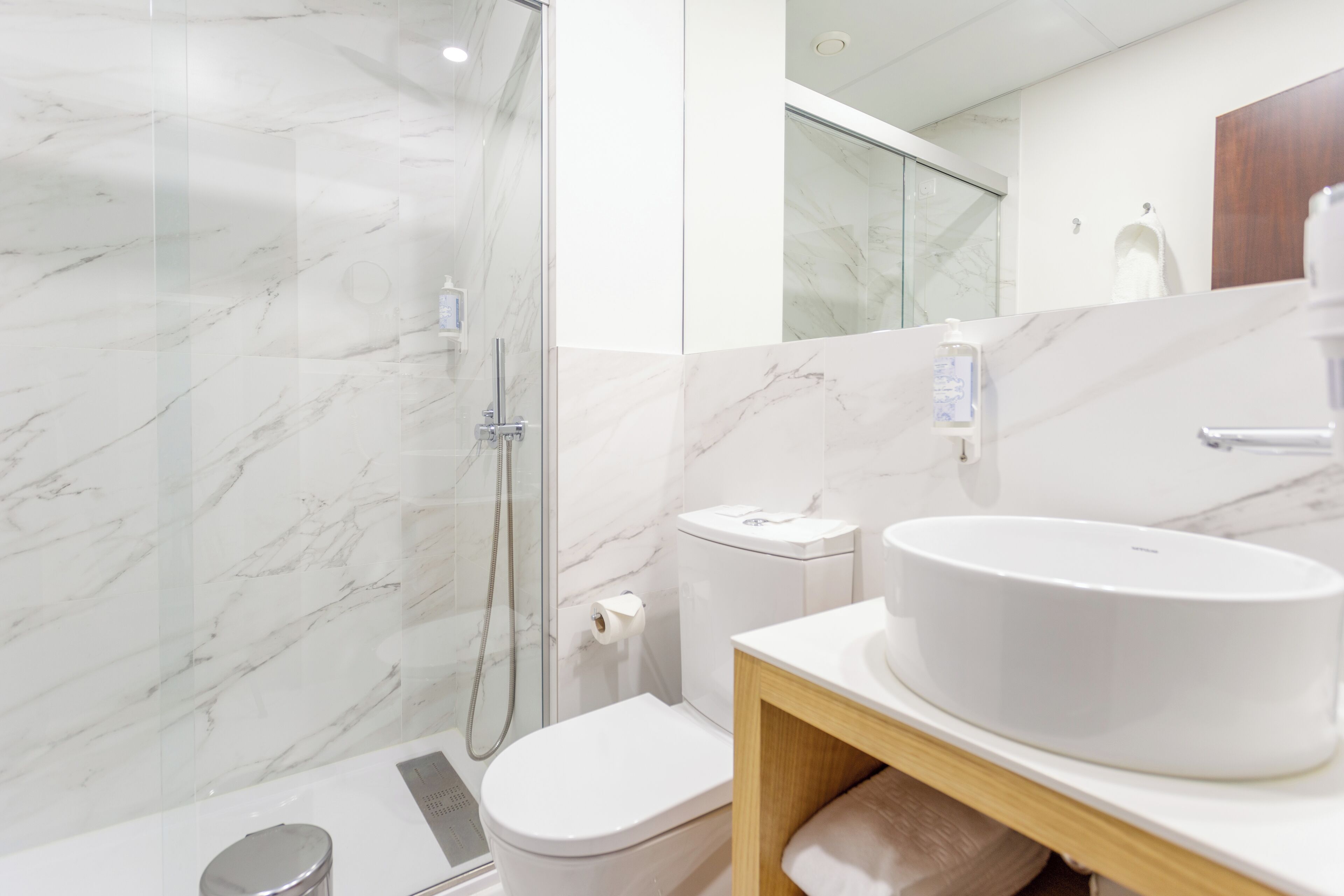 bathtub, free toiletries, hair dryer, bathrobes