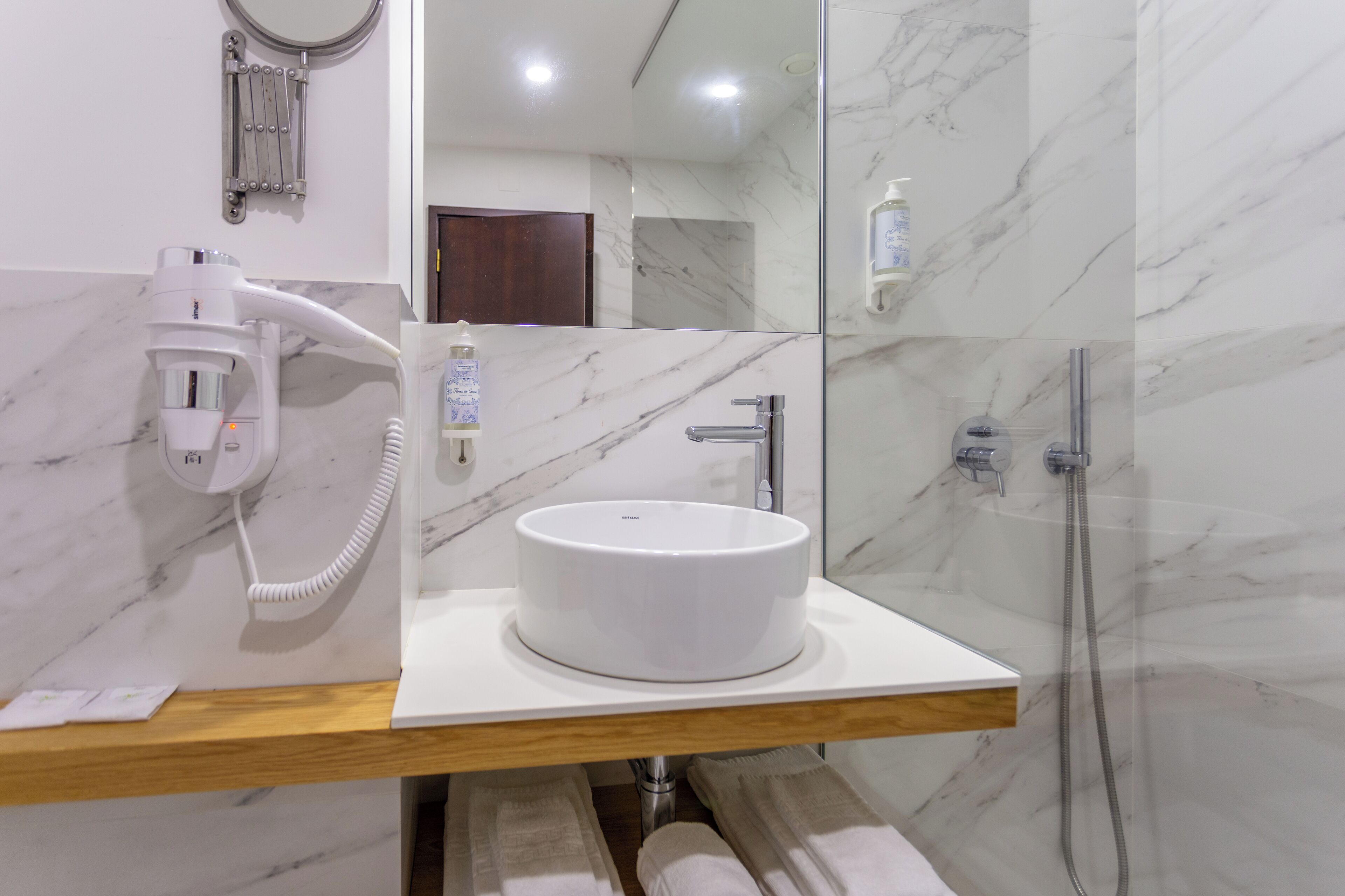 bathtub, free toiletries, hair dryer, bathrobes