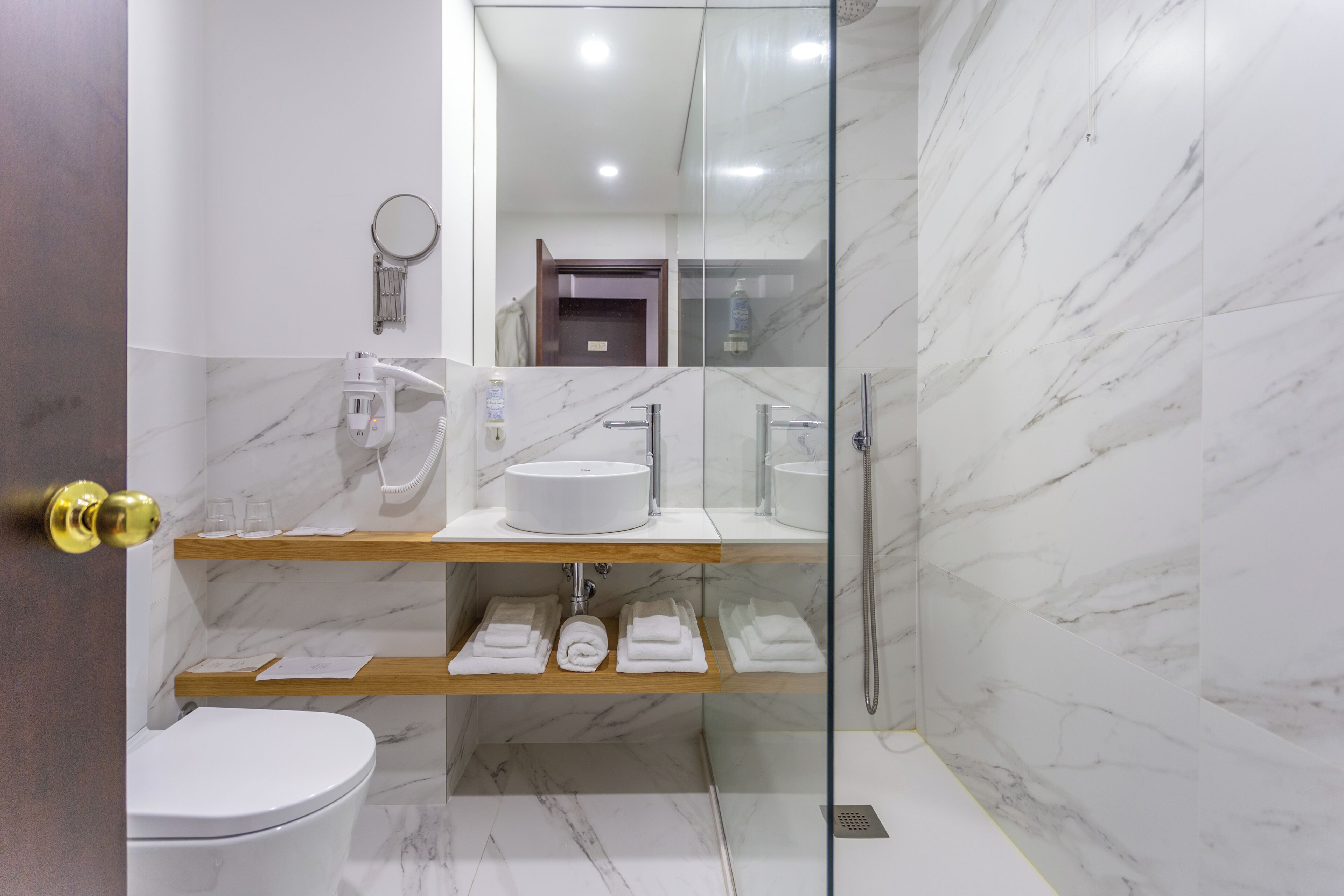 bathtub, free toiletries, hair dryer, bathrobes