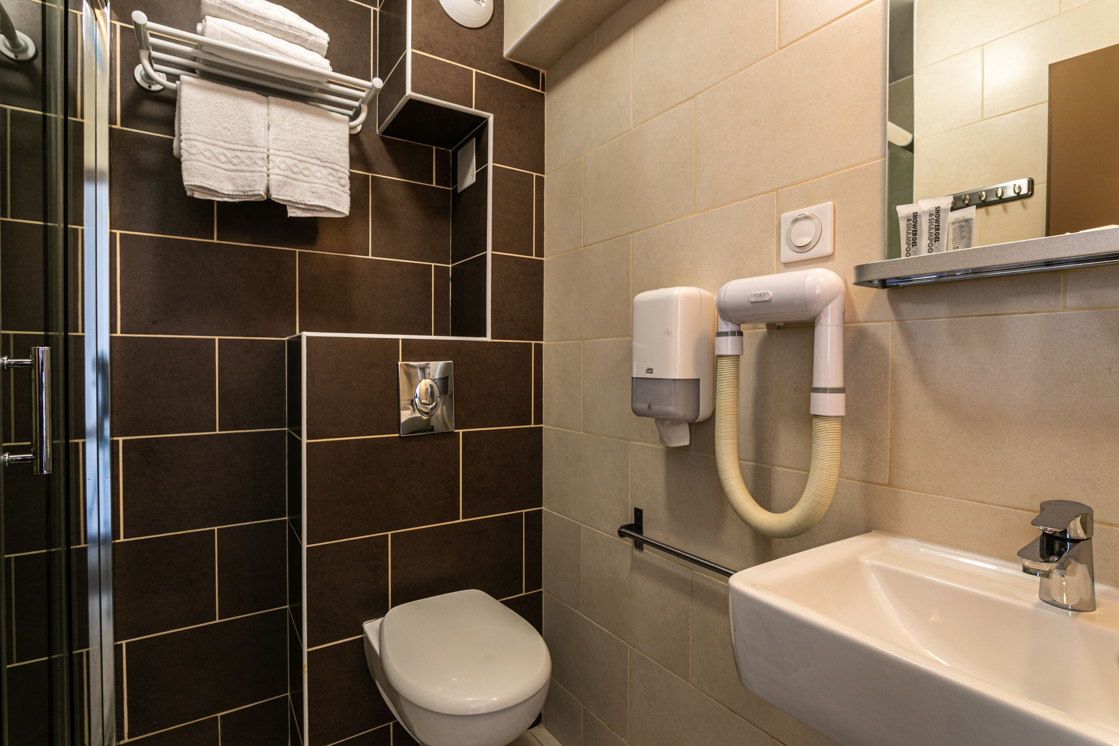 shower, free toiletries, hair dryer, towels