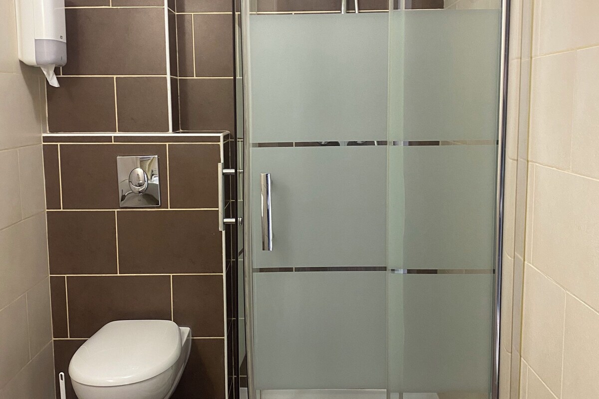Bathroom | Shower, free toiletries, hair dryer, towels